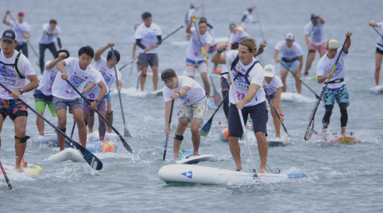 Black Project founder Chris Freeman standup paddling.