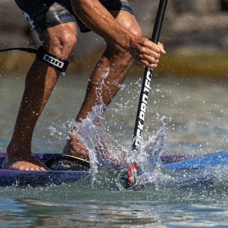 Black Project paddle being used under high strain, 2-year warranty on all parts.