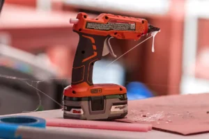 hot glue gun used during Black Project paddle assembly process